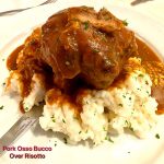 pork osso bucco over risotto,jpeg