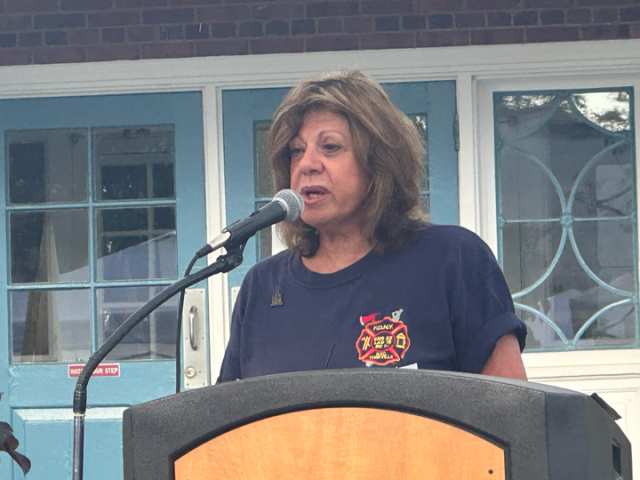 Loretta Viglione, a Parsippany local, read a moving poem titled "Poem and Reflections of 9/11", dedicated to her brother Tommy Sabella