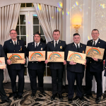 Outing-Chief-Russ-Grueter-thanking-2024-officers