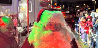 Holiday Magic Rolls In as Santa Arrives by Fire Truck