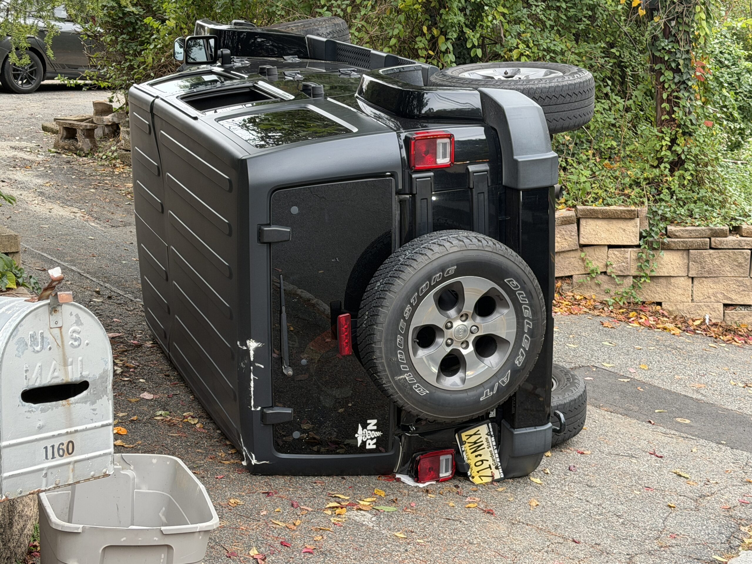 Jeep Overturns After Driver Runs Stop Sign at Knoll Road Intersection